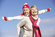 Photo: Grandmother Giving Her Granddaughter A Piggy Back Ride Grandmother Giving Her Granddaughter A Piggy Back Ride