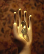 Hand with marbles