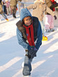 child learning ice skating