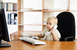 Small boy in office