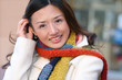 Winter Theme - Beautiful Asian Girl in White Coat and Colorful K