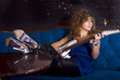 Young woman playing a guitar