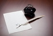 Quill, ink and paper