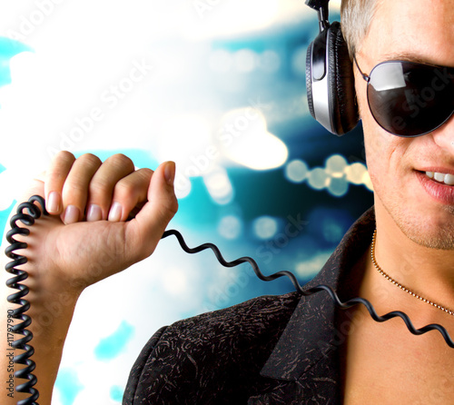 Photo: Boy is is listening to music track Boy is is listening to music track