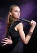 girl posing with nunchaku