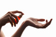 woman applying perfume on her wrist woman applying perfume on her wrist