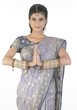 Woman in silk sari with inviting expressions