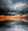 Lightning on sunset sky background