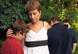 Mother comforting sons - death or divorce
