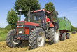 Foto: Traktor mit Anhänger Traktor mit Anhänger