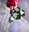 Hand Holding Snowdrop Bouquet