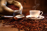 Coffee cup with burlap sack of roasted beans. ���� ����,������� ����,���� � ���������, ������� ����