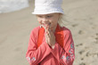Smiling cheerful girl on the seacoast II