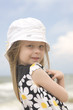 Cheerful girl in beautiful dress and hat II