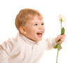 Happy liitle boy giving flower on white background
