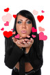 Young Woman Blowing Kisses
