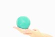blue ball in childs hands