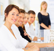 Foto: Portrait of business people during seminar Portrait of business people during seminar