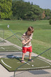 Little Boy Learning to Golf Little Boy Learning to Golf