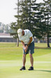 Man Playing Golf Man Playing Golf