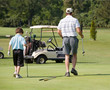 Father and Son Playing Golf Father and Son Playing Golf