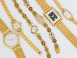 different sizes of gold watches