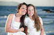 two beautiful young girls on the beach two beautiful young girls on the beach
