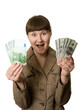 surprised woman with euros and dollars
