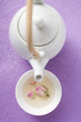 teapot and bowl of rose tea