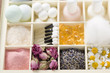 various beauty products and flowers in type case