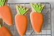 easter biscuits (carrots) on cake rack
