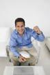 Man Holding Credit Card