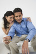 Couple Holding Credit Card