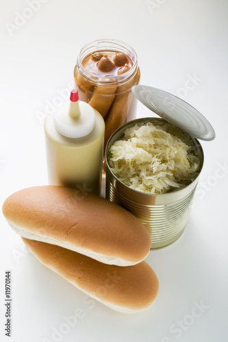 Photo: bread rolls, sauerkraut in tin, mustard, frankfurters in jar bread rolls, sauerkraut in tin, mustard, frankfurters in jar