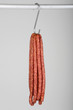 mettwurst (cured, smoked pork sausages) on a hook