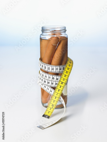 Photo: frankfurters in a jar with a tape measure wrapped around it frankfurters in a jar with a tape measure wrapped around it