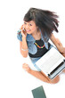 young student calling smiling flicking hair high angle