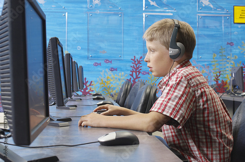  Headphones  Laptop on School Boy Wearing Headphones In Computer Room    Moodboard  11979342