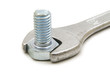 bolt and spanner on white background