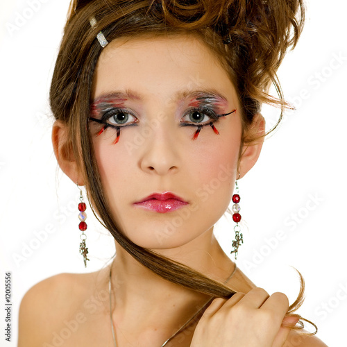 Photo: Face closeup of girl with special eye makeup Face closeup of girl with special eye makeup