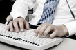 Foto: Typing on computer keyboard Typing on computer keyboard