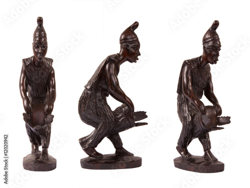 Photo: African folk art wooden carving man playing drum African folk art wooden carving man playing drum