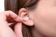 Woman Cleaning Ear