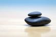 Zen stones on wooden surface