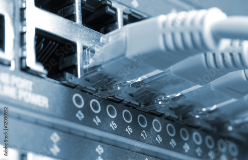 Foto: network cables connected to switches network cables connected to switches