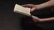 woman reading a prayer book