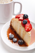 Coffee and cheesecake decorated with jam and berries
