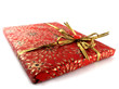 Red giftbox with a gold bow