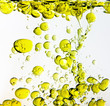 Olive Oil Poured into Water