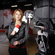 attractive news reporter in front of the video camera